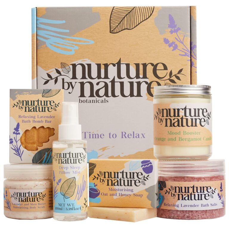 Nurture by Nature" gift set with bath products, including bath salts and candles